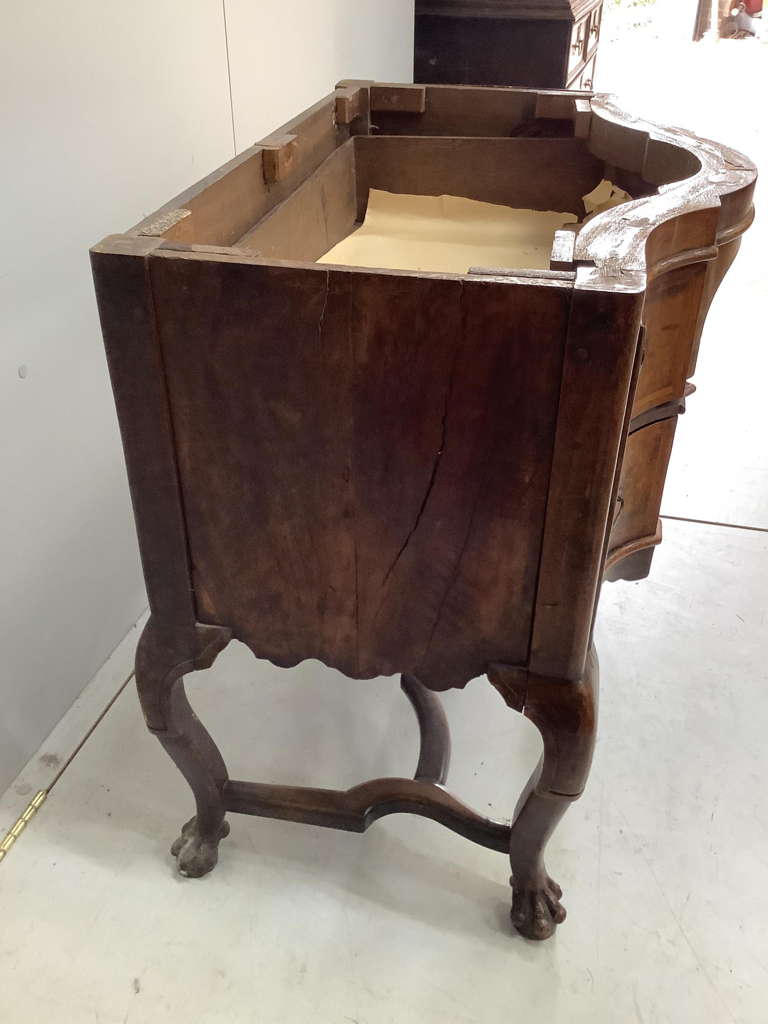 A 19th century Dutch serpentine walnut dressing table with associated triptych mirror, width 83cm. Condition - fair, some losses